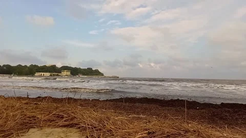 Panoramic view of dirty sea, heaps of garbage on sandy shore, pollution Stock Footage 252040034