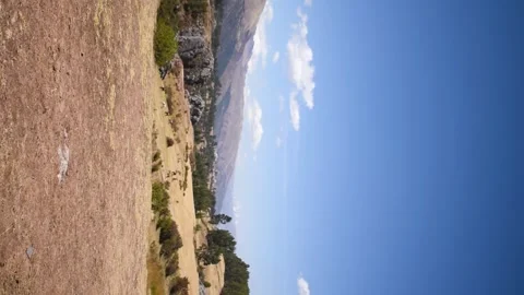 Panoramic view of distant trees and mountains from side to side Stock Footage 293094657