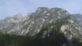 Panoramic view of Dolomites and lake Braies with wooden house, South Tyrol 4k or 4k+ Resolution