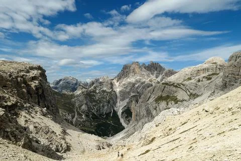 A panoramic view on Dolomites in Italy with sharp and steep mountain slopes Stock Photos