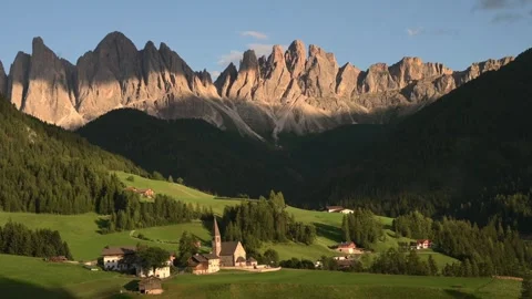 Panoramic view of Dolomites mountain range and alpine village in South Tyrol Stockbeeldmateriaal 319668293