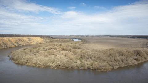 Panoramic view of Don River bend showing sandy cliffs and agricultural fiel.. Photos