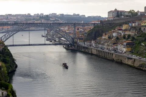 Panoramic view of Douro river and D. Luis I Bridge in Portugal. Stock Photos