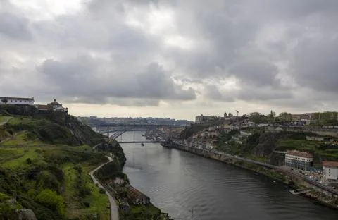 Panoramic view of Douro river and D. Luis I Bridge in Portugal. Stock Photos