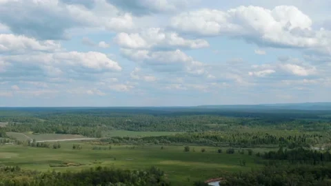 Panoramic view from the drone of a beautiful valley with forest and fields Stock Footage 146992460