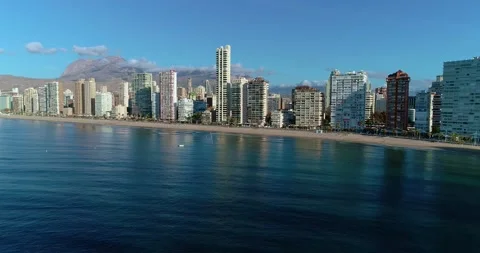 Panoramic view with a drone of the coastline of Benidorm city in Spain Stock Footage 146877947