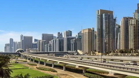 Panoramic view of a Dubai featuring high-rise buildings and an elevated metro 스톡 사진