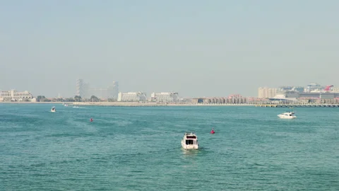 Panoramic view of Dubai as seen from Marina Beach Видео 220107729