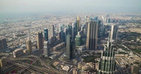 Panoramic view of Dubai skyline from Burj Khalifa tower skyscraper. Time lapse Stock Footage 170688094