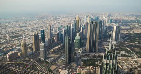 Panoramic view of Dubai skyline from Burj Khalifa tower skyscraper. Time lapse Stock Footage 171984678