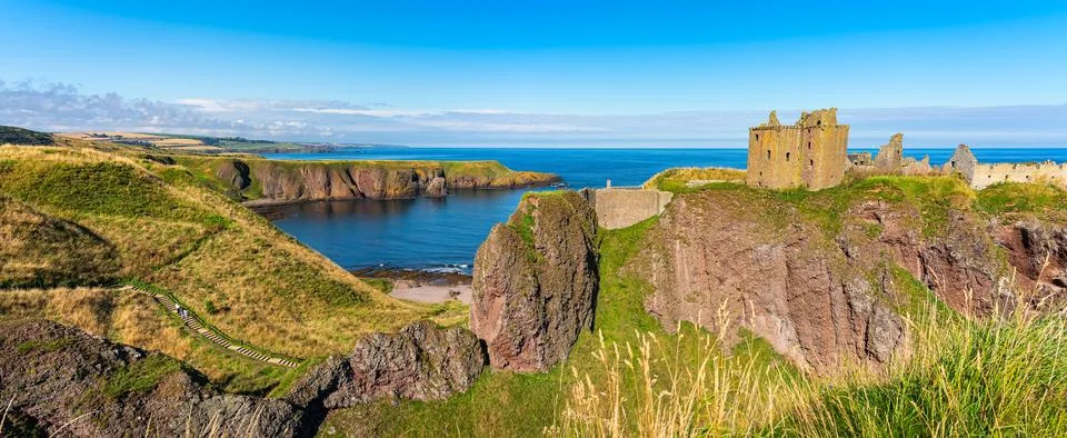 Panoramic view of Dunnottar Castle on the cliffs of eastern Scotland, UK. Stock Photos