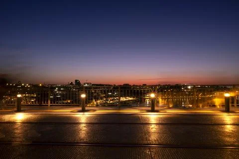 Panoramic view at dusk over D. Luís I bridge with Douro river in background. Stock Photos