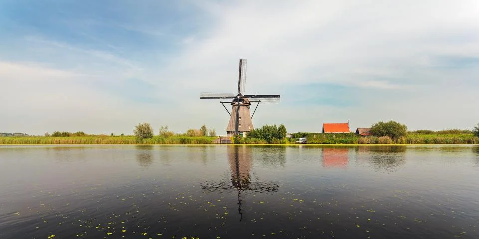 Panoramic view of a dutch windmill at kinderdijk Stock Photos