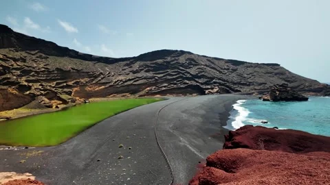 Panoramic view of El Golfo black sand beach and green lagoon, Lanzarote Stock Footage 346375832