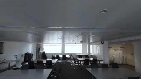 A panoramic view of the empty boardroom or conference room, adorned with Stock Footage 268023676