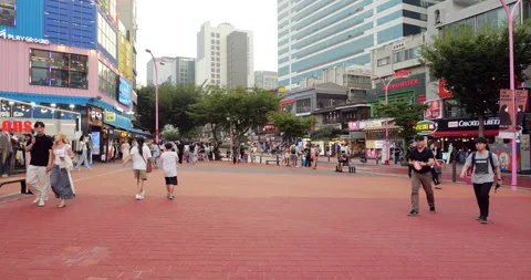 Panoramic view of empty Hongdae Street during daytime, slow motion shot Stock Footage 292920837