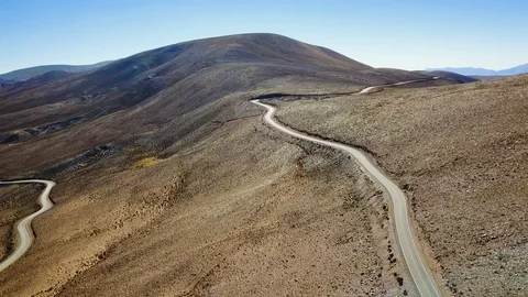 Panoramic view of empty mountain highway, AERIAL CUESTA DEL LIPAN ALTIPLANO Stock Footage 88343954