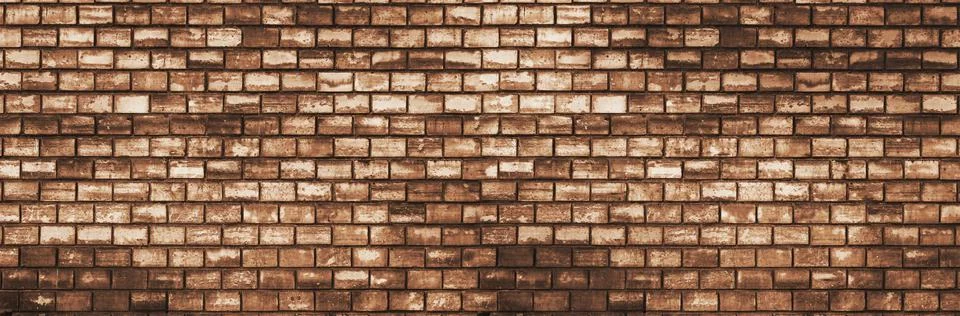 Panoramic view empty, old, yellow brick wall background with copy space Stock Photos