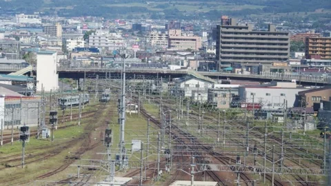 Panoramic view of empty railway tracks in town, Hakodate, Japan, 2026.09.10. 動画素材 345424750