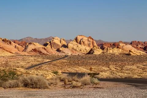 Panoramic view of endless winding empty road in Valley of Fire State Park l.. Stock Photos