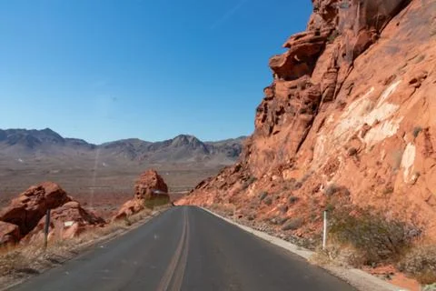 Panoramic view of endless winding empty Mouse tank road in Valley of Fire S.. Stock Photos