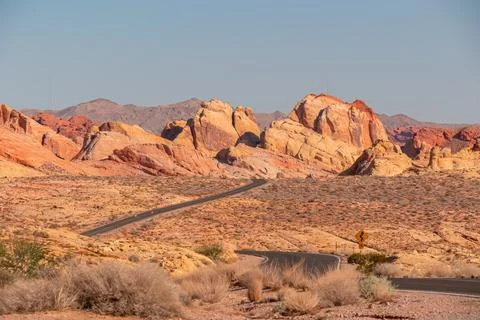 Panoramic view of endless winding empty road in Valley of Fire State Park l.. Stock Photos