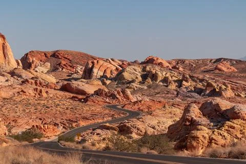 Panoramic view of endless winding empty road in Valley of Fire State Park l.. Stock Photos