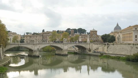 Panoramic view of famous river Tiber bridge with traffic in Rome Vatican city,4k Stock Footage 221871535