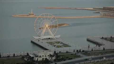 Panoramic view of the Ferris wheel revolves near the sea. Baku, Azerbaijan. Stock Footage 125913305