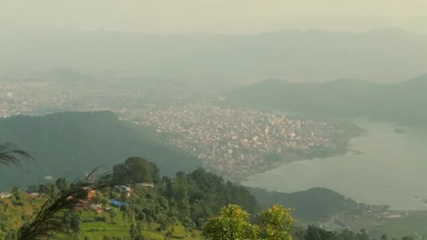 Panoramic view of Fewa lake and Pokhara city during a rainy day Stock Footage 143284161