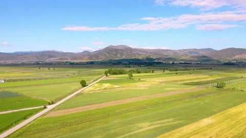 Panoramic view of fields with parcels planted by agricultural farms on a Stock Footage 132822929