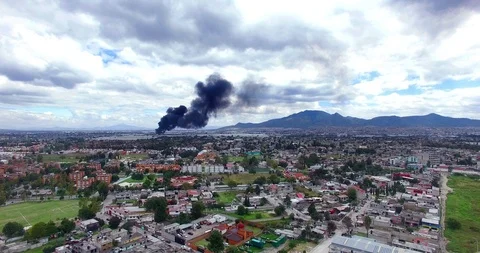 Panoramic view a fire destroy a liquor factory. Stock Footage 97114666
