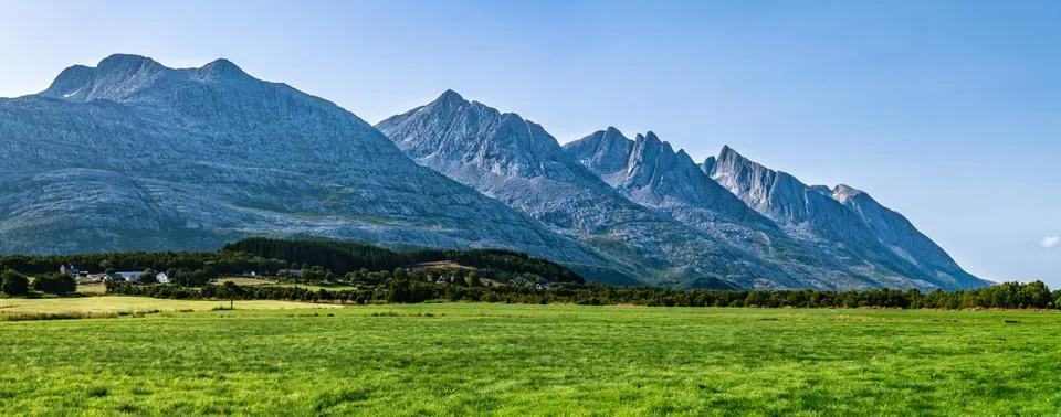 Panoramic view at five of Seven Sisters Mountain range on Sandnessjoen, ideal Stock Photos