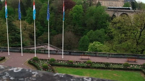Panoramic view of the Flags of Luxembourg and the European Union Stock Footage 303970778