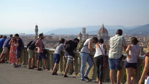 Panoramic view of Florence with crowd of tourists on Piazza Michelangelo. Italy. Stock Footage 94968312