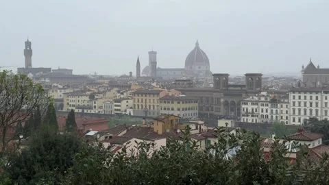 Panoramic view of Florence with Duomo and Arno River under rainy April sky Stock Footage 306959838