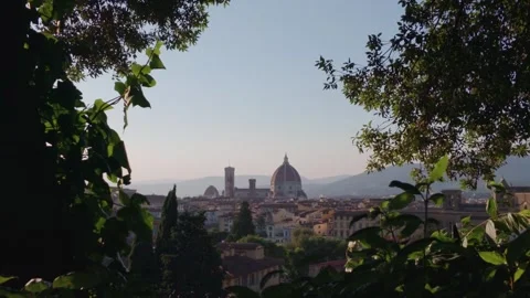 Panoramic View of Florence Skyline with Cathedral Dome Framed by Trees at S.. Video stock 340749829