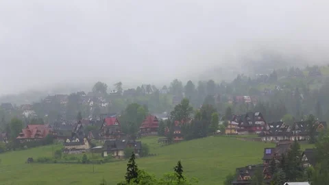 Panoramic view of fog over the Tatra mountain range in summer. Rainy day, c.. Vídeos de archivo 329063585