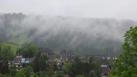 Panoramic view of fog over the Tatra mountain range in summer. Rainy day, c.. Vídeos de archivo 329063793