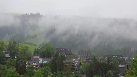 Panoramic view of fog over the Tatra mountain range in summer. Rainy day, c.. Vídeos de archivo 329063797