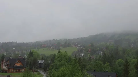 Panoramic view of fog over the Tatra mountain range in summer. Rainy day, c.. Vídeos de archivo 329063904