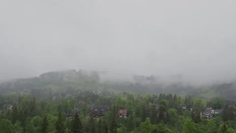 Panoramic view of fog over the Tatra mountain range in summer. Rainy day, c.. Vídeos de archivo 329063905