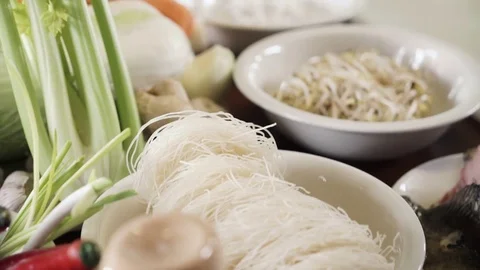 Panoramic view of fresh healthy vegetables in a plates on kitchen table Stock Footage 73210983