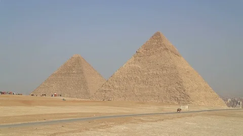 Panoramic view of Giza Pyramids located on Giza Plateau in greater Cairo, Egypt Stock Footage 125931409