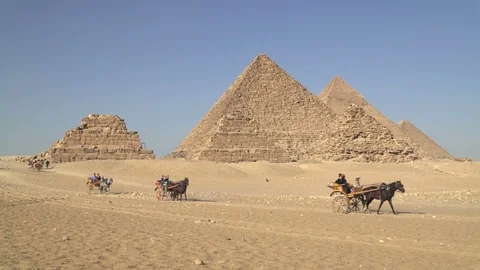 Panoramic view of Giza Pyramids located on Giza Plateau in greater Cairo, Egypt Stock Footage 125938105