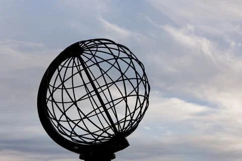 Panoramic view of the globe on the North Cape Plateau at midnight. Stock Photos