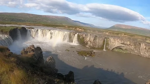 Panoramic view of Godafoss waterfall with a rainbow, Iceland Stock Footage 333412802