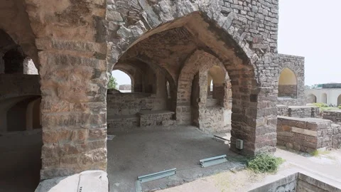Panoramic view of Golconda fort with visitors viewing the famous landmark Stock Footage 283338995