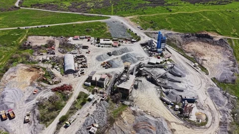 Panoramic view of granite quarry and scenic blue lake Stockbeeldmateriaal 338222106