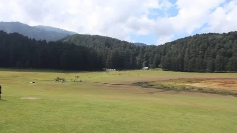 Panoramic view of Green fields in Khajjiar Himachal Pradesh Stock Footage 72397058